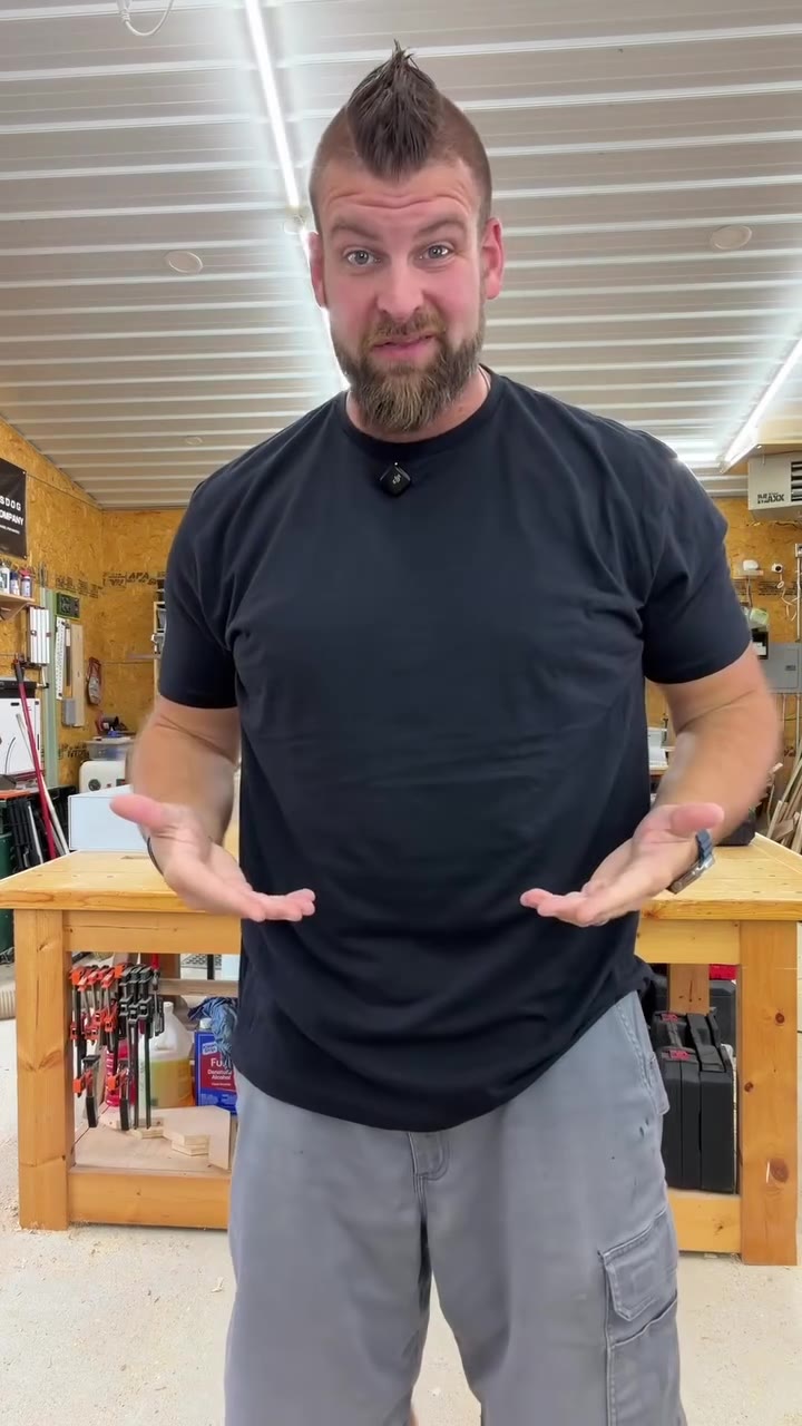 The same man in a fitted black Patriot Crew tee